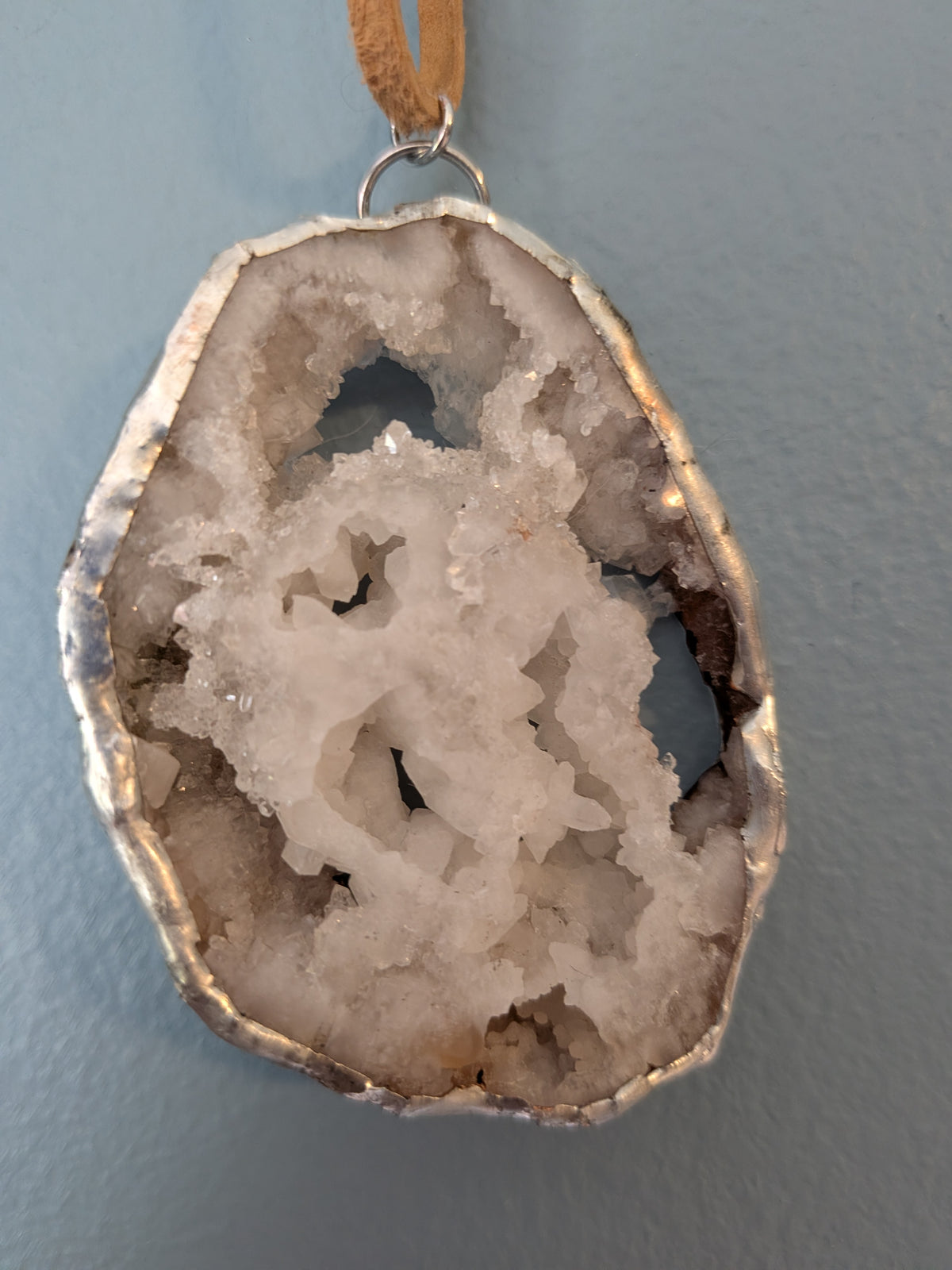 Necklace No. 012: alternate close-up of the cream geode, natural stone detail and handmade silver-tone edging.