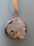 Necklace No. 014: front close-up of the blue agate, natural stone detail and handmade silver-tone edging.