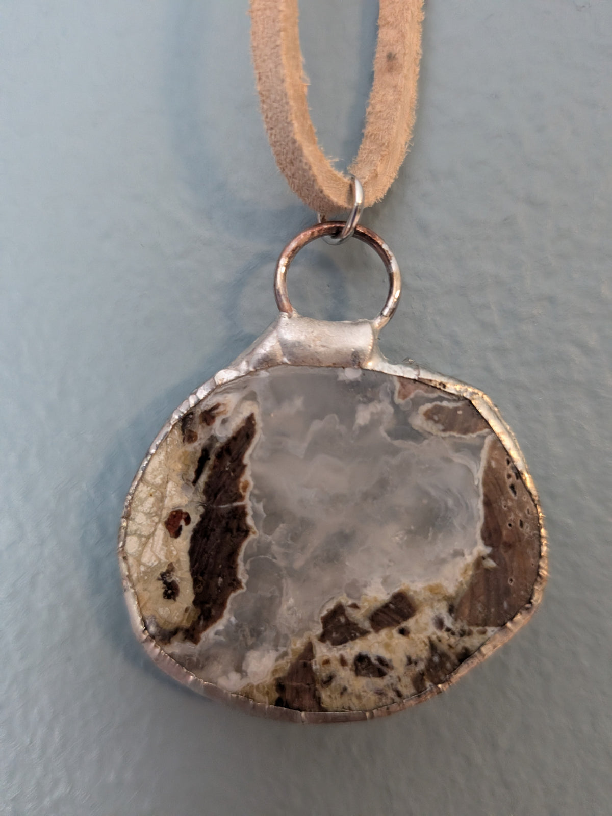 Necklace No. 014: alternate close-up of the blue agate, natural stone detail and handmade silver-tone edging.