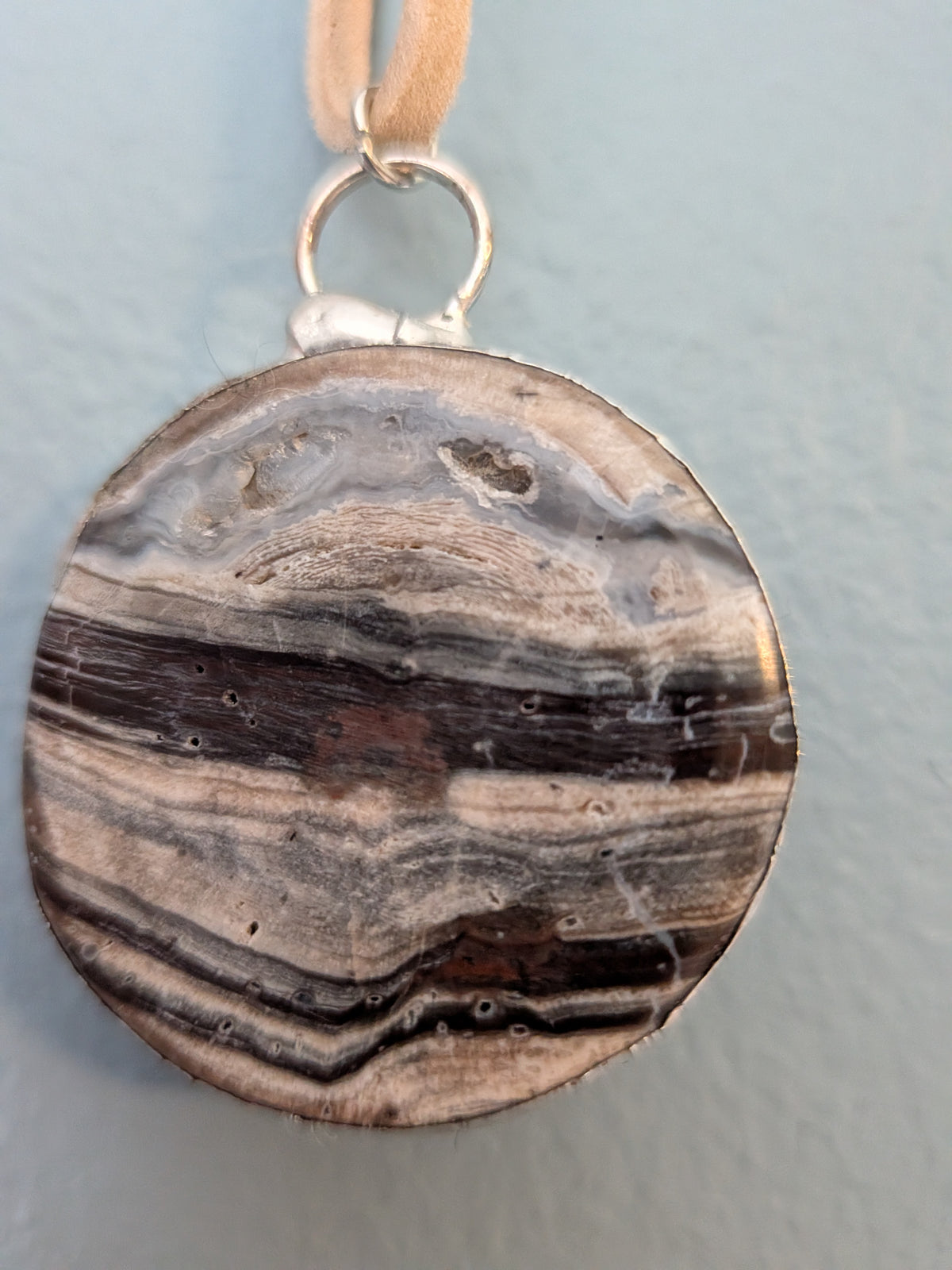 Necklace No. 016: alternate close-up of the stone, natural stone detail and handmade silver-tone edging.
