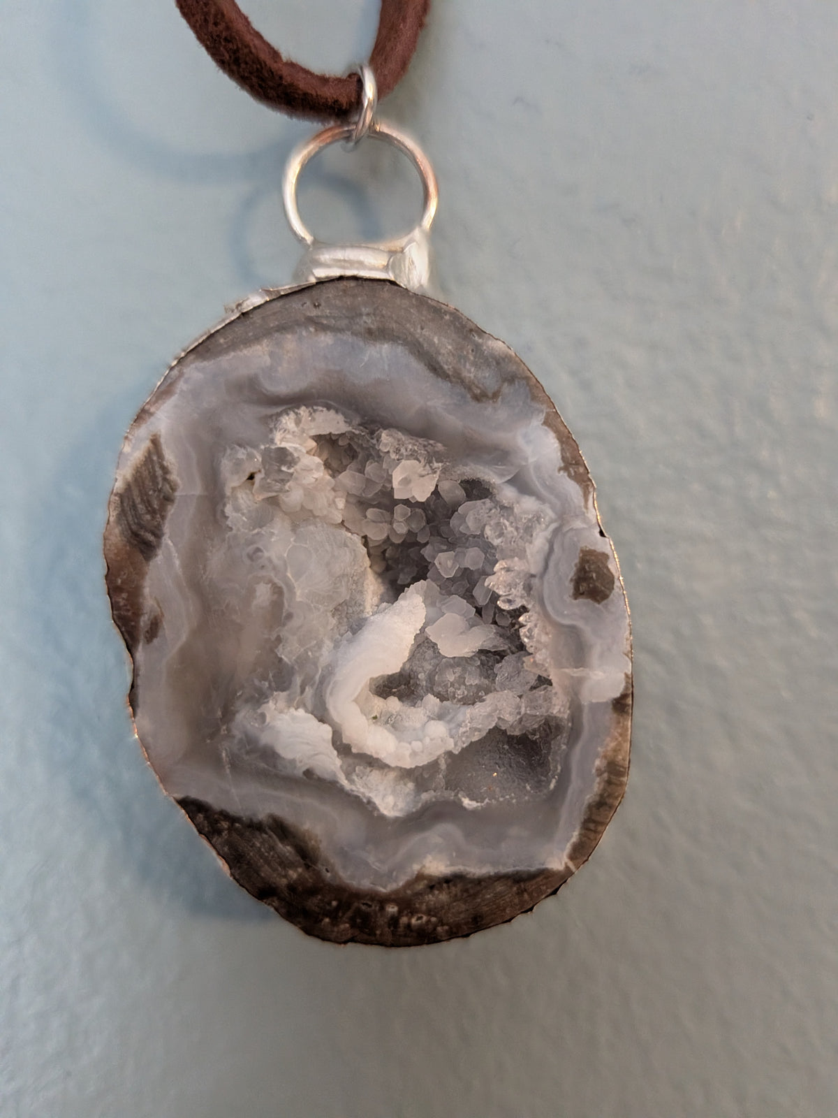 Necklace No. 019: front close-up of the blue agate, natural stone detail and handmade silver-tone edging.