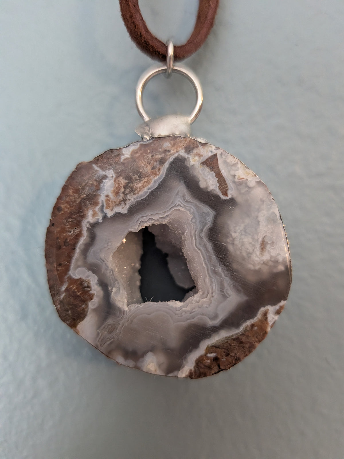 Necklace No. 021: front close-up of the dugway geode, natural stone detail and handmade silver-tone edging.