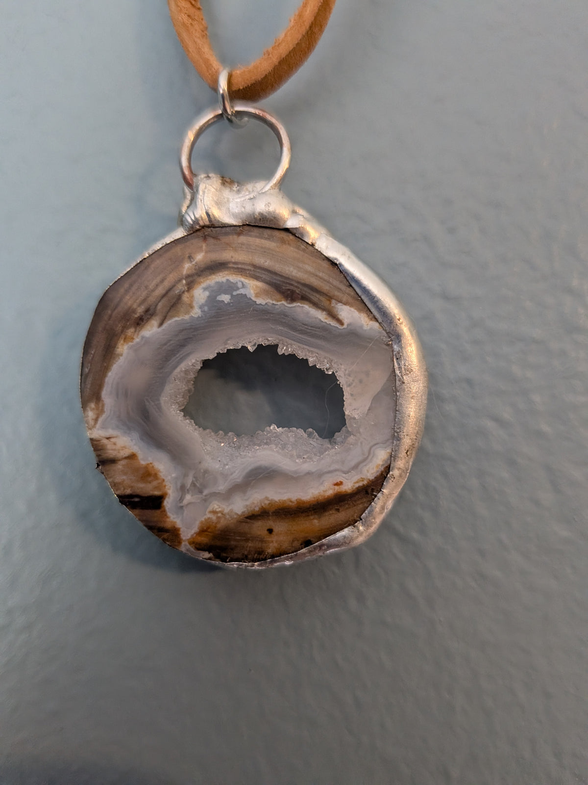 Necklace No. 007: reverse close-up of the dugway geode, natural stone detail and handmade silver-tone edging.